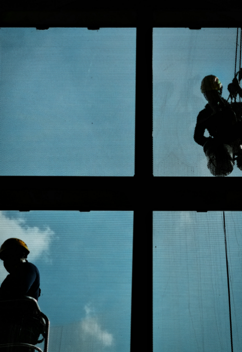 High-altitude glass cleaner insurance, guarding the city spi